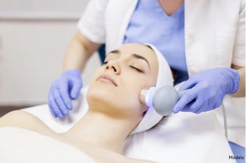 Women undergoing a CO2 laser resurfacing at medspa facility.